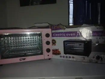 Horno eléctrico nuevo color rosa barbie