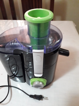 Exprimidor de frutas y verduras electrico