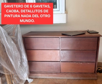 Gavetero de 6 gavetas es caoba detallitos percaminuta de pintura.