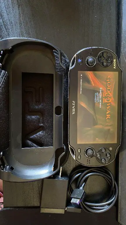 PsVita oled Hakeado con tienda y juegos Foto 7266032-1.jpg