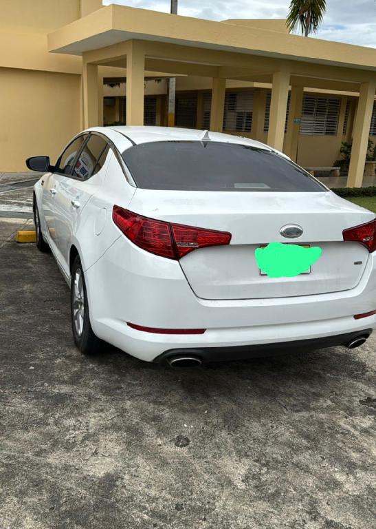 por motivo de viaje vendo kia optima 2014 oportunidad. version america Foto 7311707-1.jpg